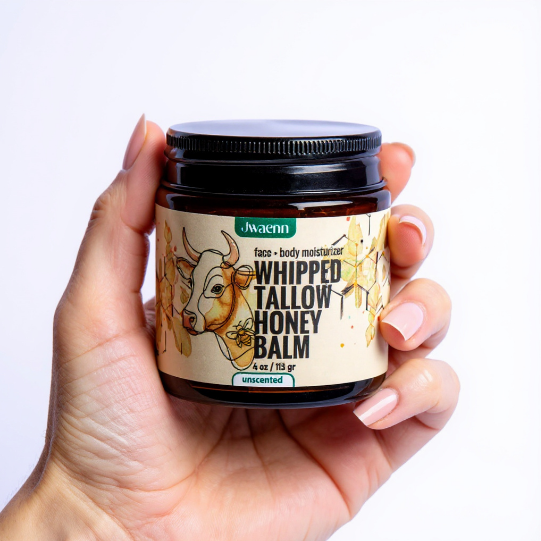 Jwaenn Whipped Tallow Honey Balm in a glass jar, a potent natural skincare essential.