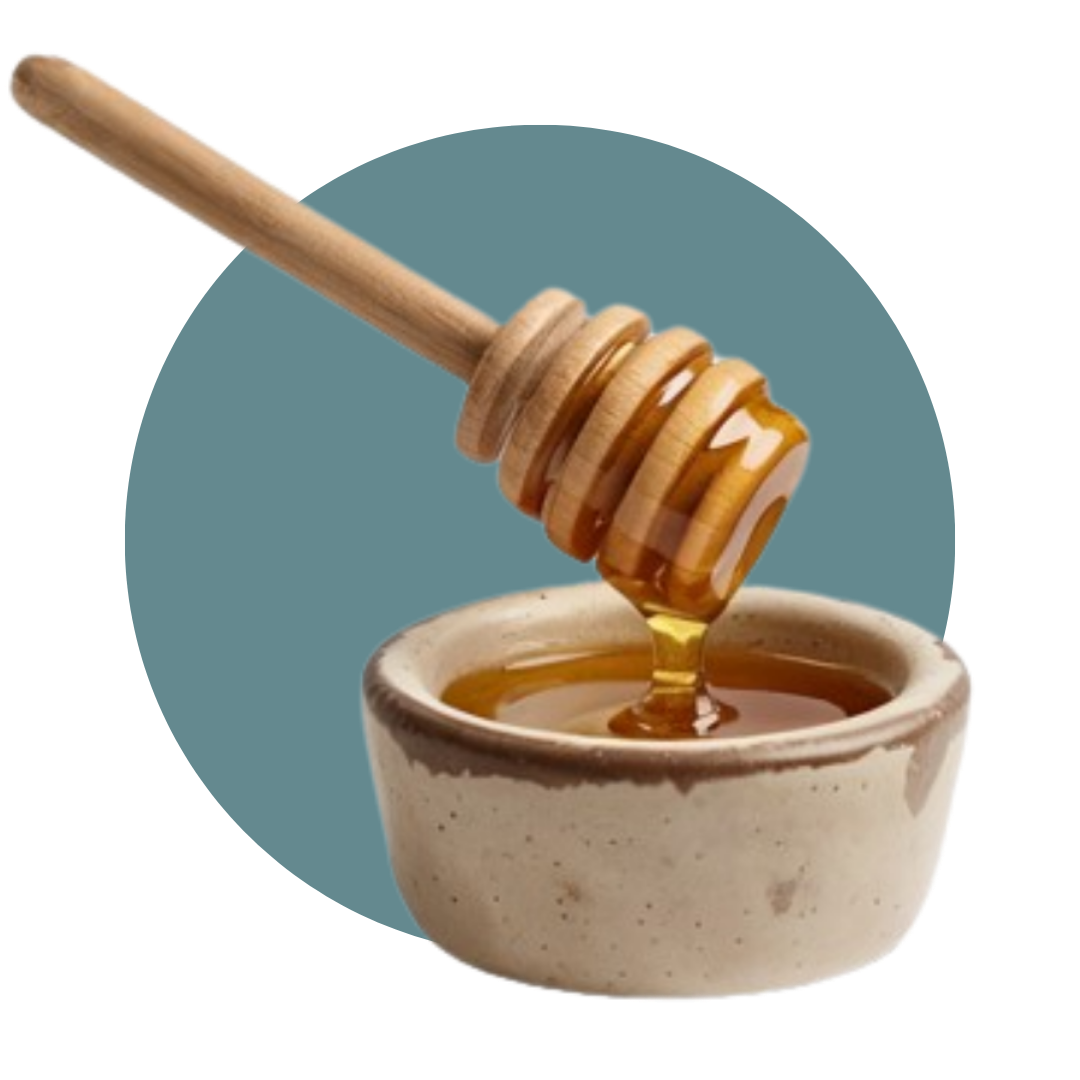 Close-up of raw honey and clean, natural ingredients used in Jwaenn's formula.